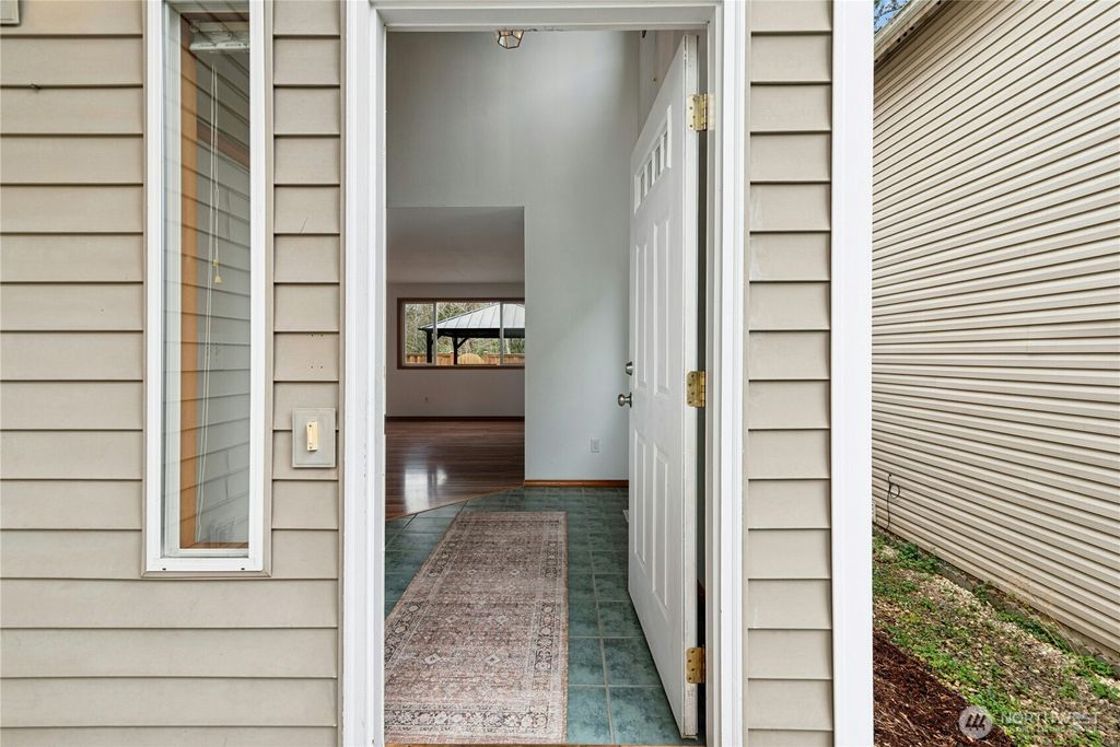 Photo of 711 123rd Avenue NE, Lake Stevens, WA 98258 (MLS # 2498101)