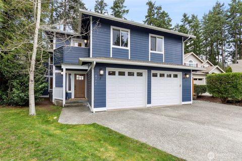 Photo of 8757 NE Rosario Place, Bainbridge Island, WA 98110 (MLS # 2489220)