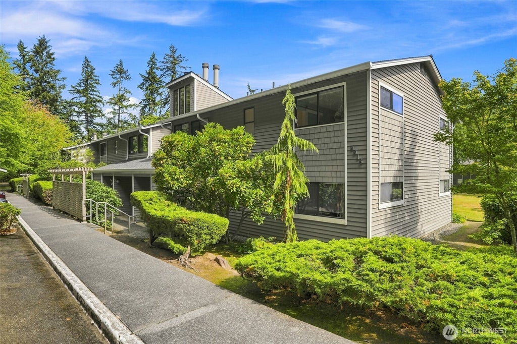 Photo of 9918 NE 144th Lane #406, Kirkland, WA 98034 (MLS # 2578886)