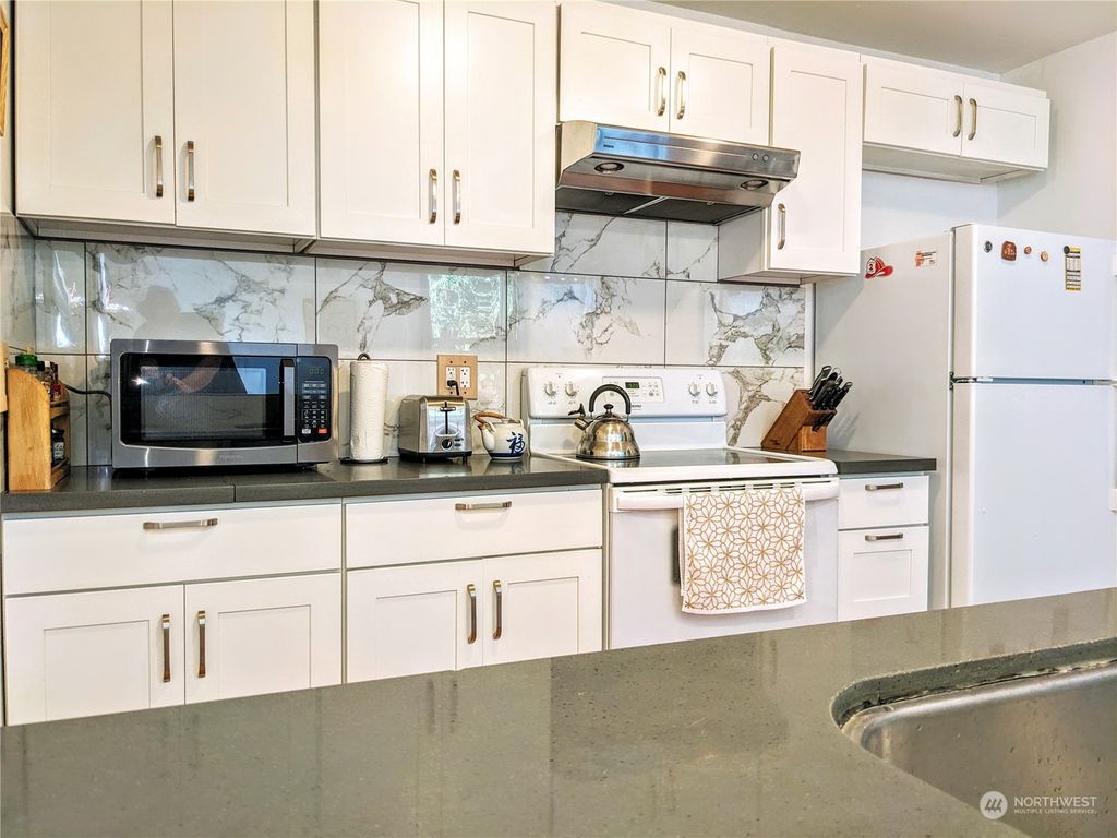 Photo of 10048 62nd Avenue S, Seattle, WA 98178 (MLS # 2129614)