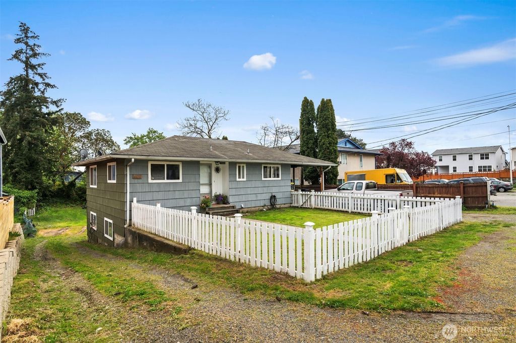 Photo of 9444 5th Avenue SW, Seattle, WA 98106 (MLS # 2372070)
