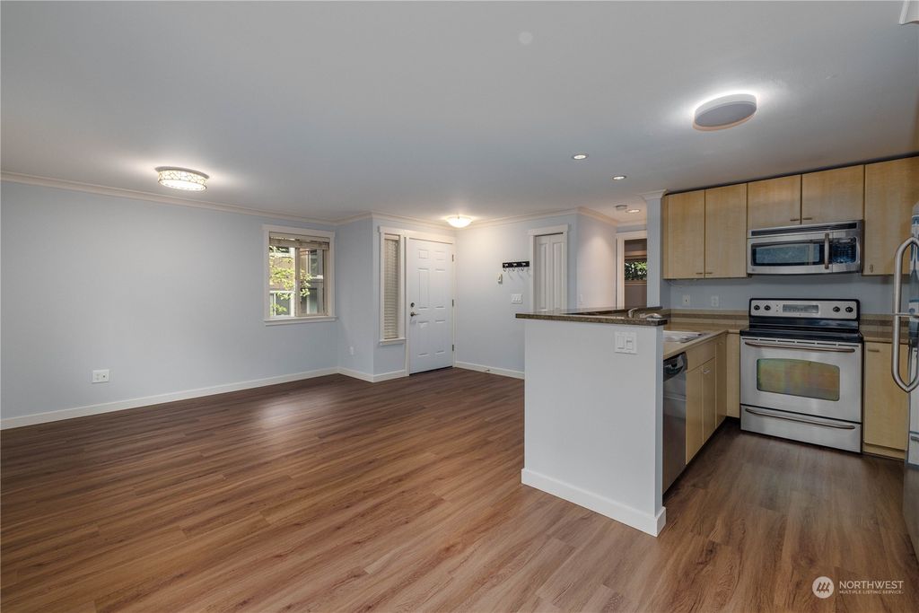 Photo of 8250 126TH Avenue NE #1E, Kirkland, WA 98033 (MLS # 2031452)