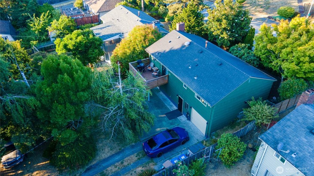 Photo of 9413 26th Avenue SW, Seattle, WA 98106 (MLS # 2409786)