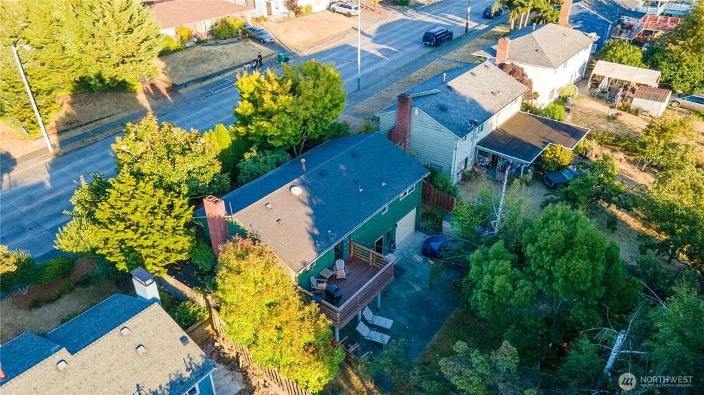 Photo of 9413 26th Avenue SW, Seattle, WA 98106 (MLS # 2409786)