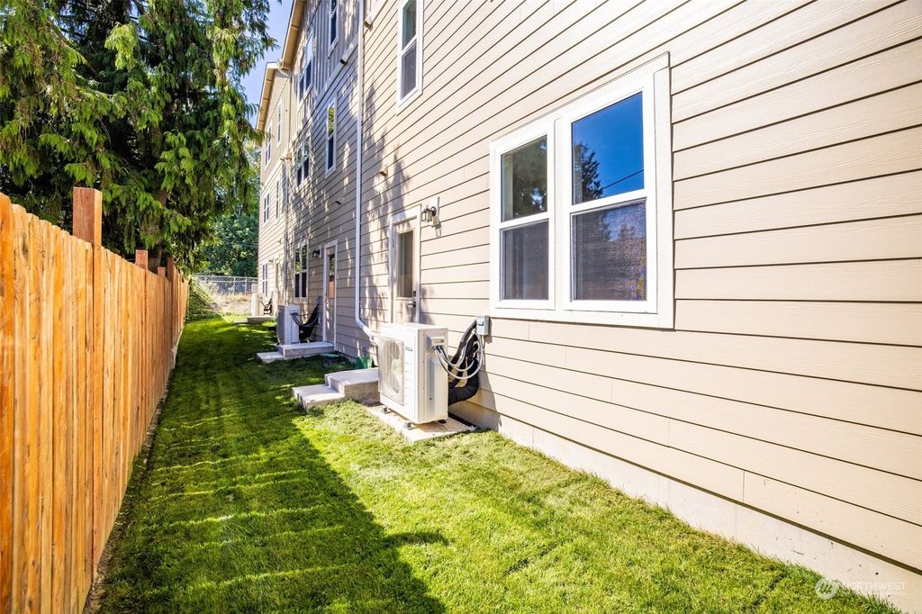 Photo of 3411 S 144th Lane, Tukwila, WA 98168 (MLS # 2287432)