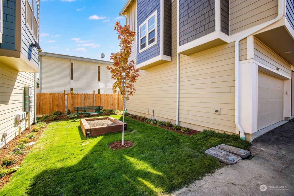 Photo of 3411 S 144th Lane, Tukwila, WA 98168 (MLS # 2287432)