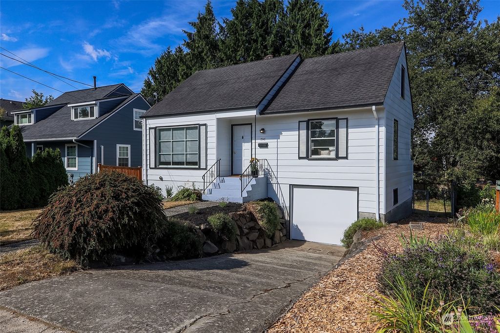 Photo of 7547 11th Ave Ave NW, Seattle, WA 98117 (MLS # 2272613)