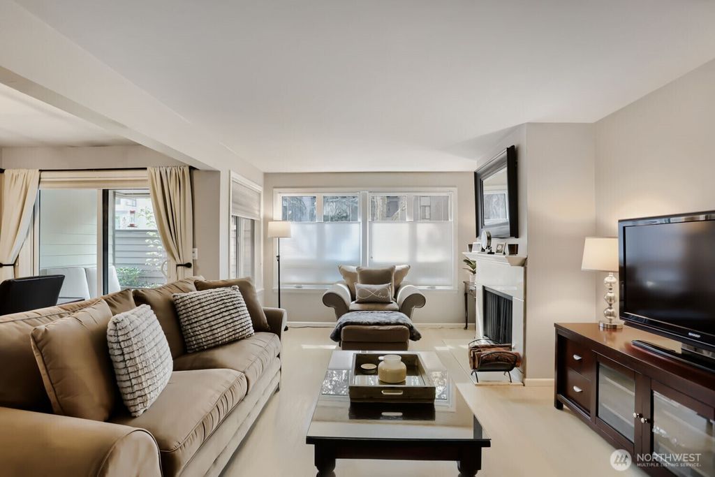 Photo of 6300 Sand Point Way NE #103, Seattle, WA 98115 (MLS # 2528426)