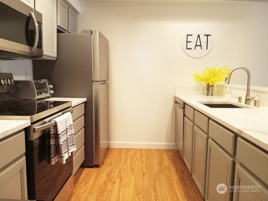 Photo of 2301 NE Blakeley Street #303, Seattle, WA 98105 (MLS # 2245574)