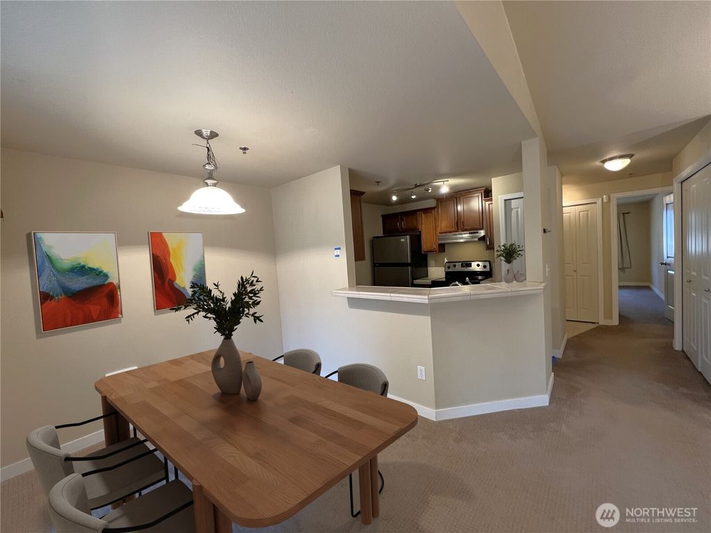 Photo of 11527 HWY99 #D 303, Everett, WA 98204 (MLS # 2520889)