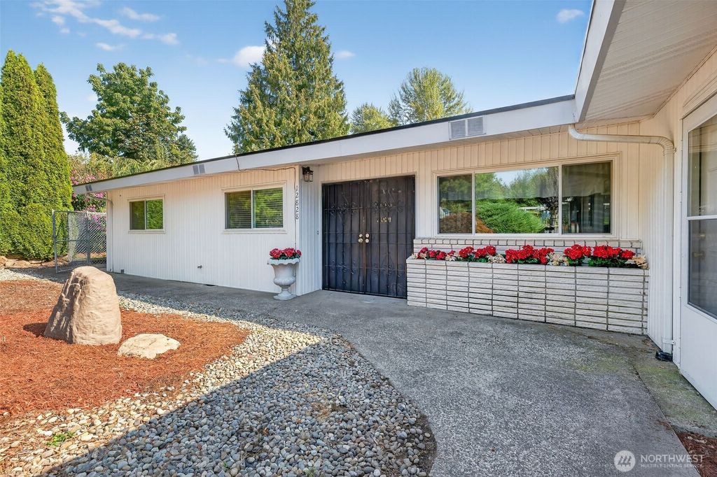 Photo of 12828 78th Avenue S, Seattle, WA 98178 (MLS # 2431751)