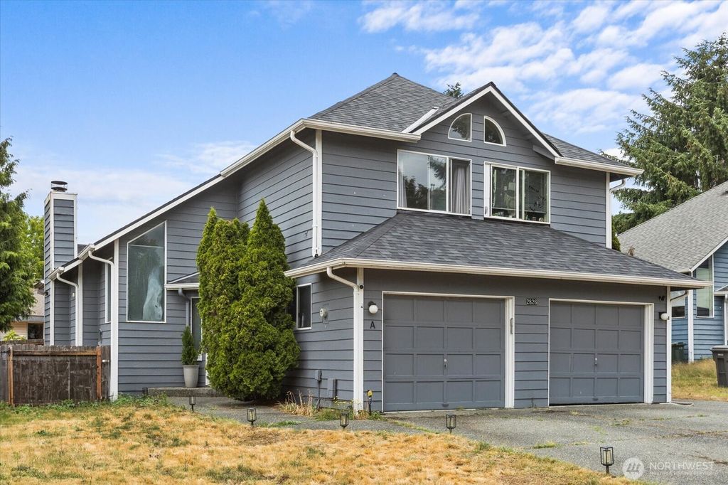 Photo of 2826 NE 8th St #A, Renton, WA 98056 (MLS # 2509716)
