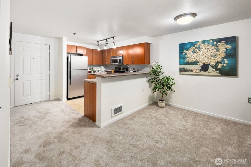 Photo of 8745 Greenwood Avenue N #209, Seattle, WA 98103 (MLS # 2417521)