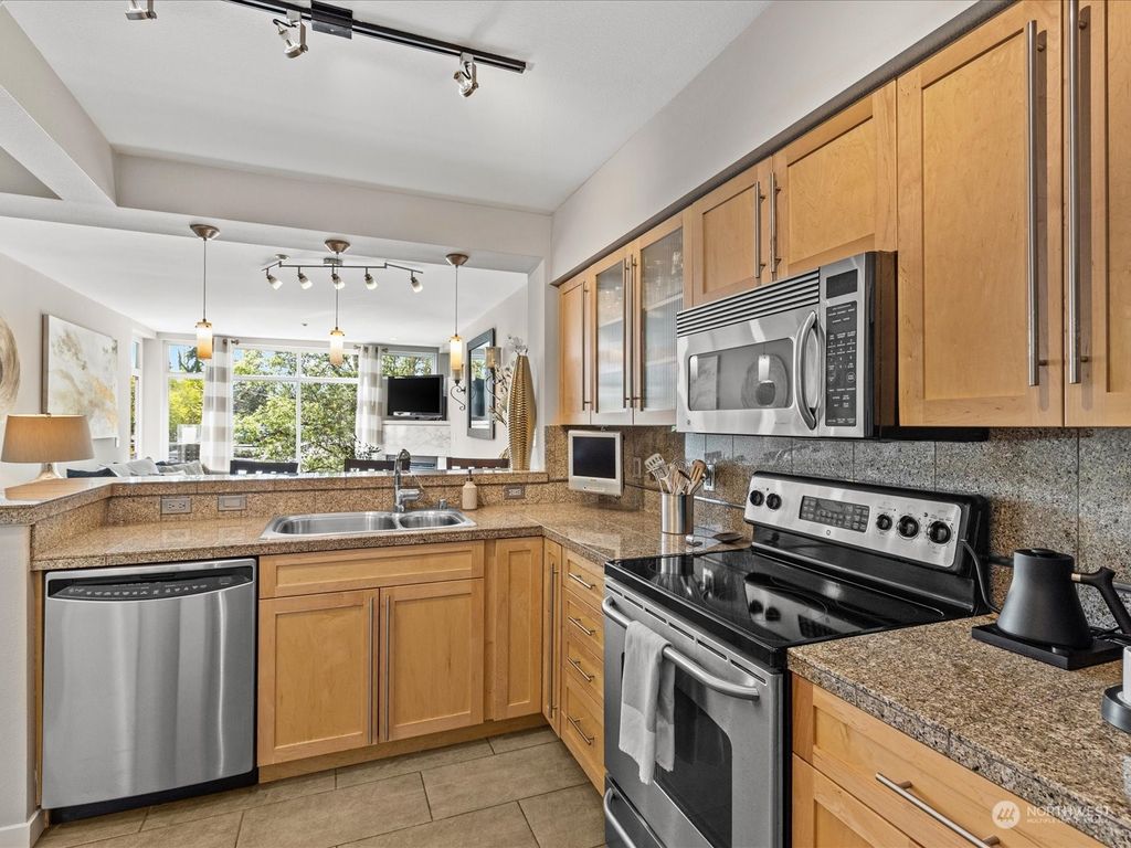 Photo of 211 Kirkland Avenue #309, Kirkland, WA 98033 (MLS # 2223356)
