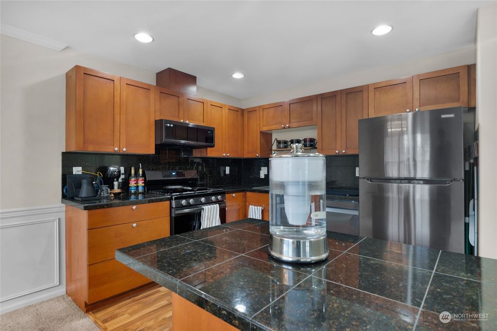 Photo of 10549 Stone Avenue N #304, Seattle, WA 98133 (MLS # 2193474)