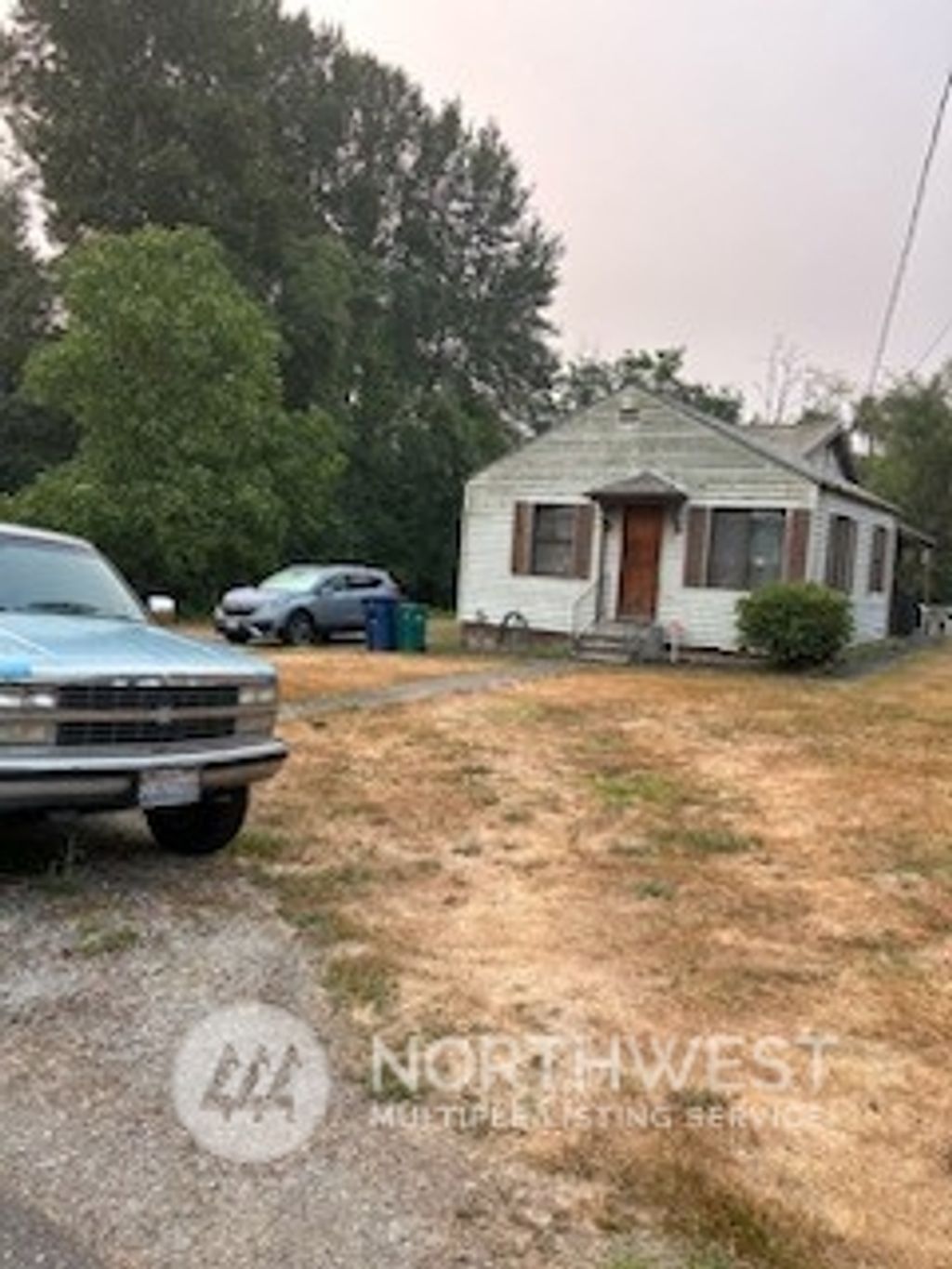 Photo of 4821 S 136th Street, Tukwila, WA 98168 (MLS # 2154185)