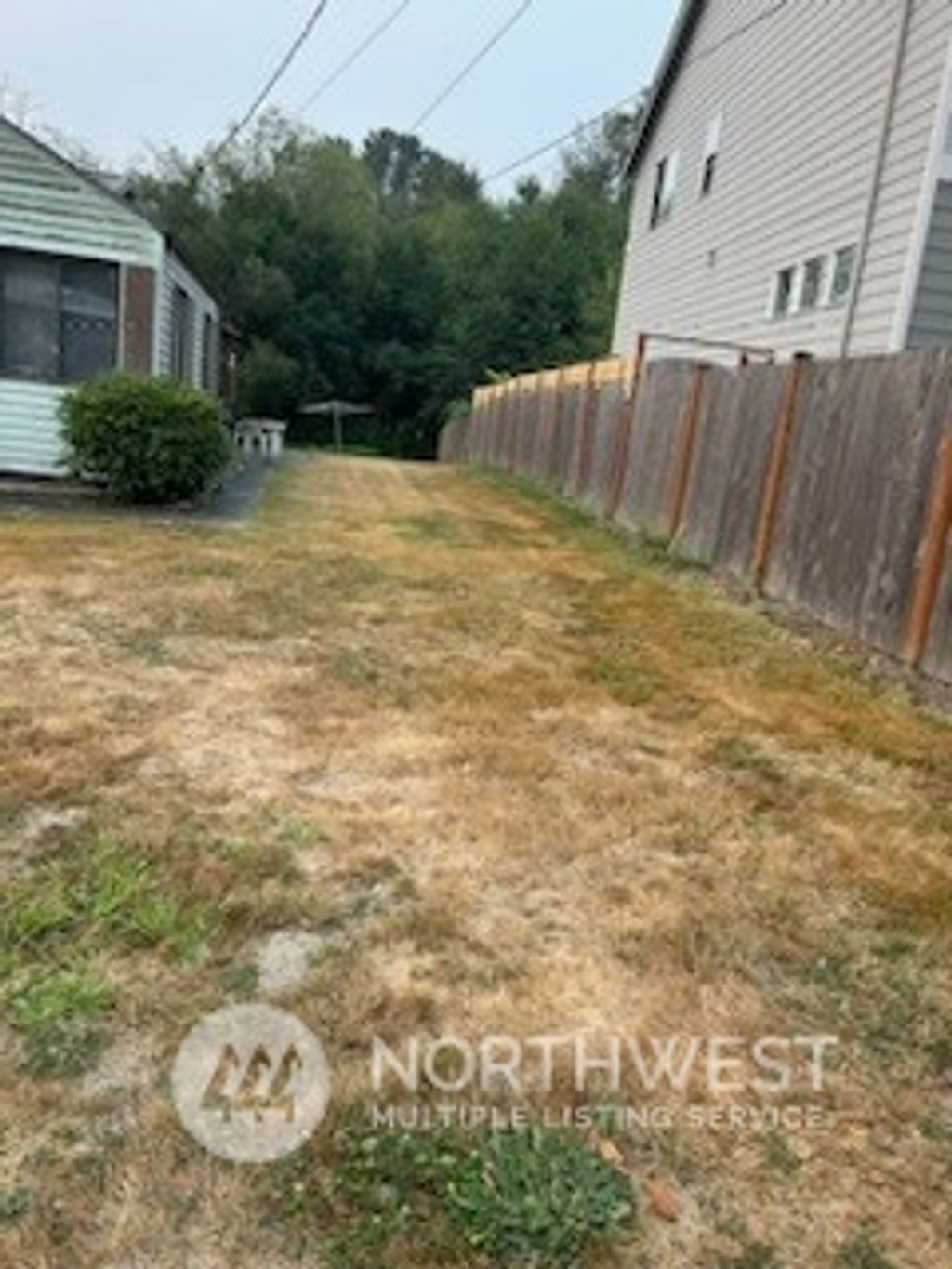 Photo of 4821 S 136th Street, Tukwila, WA 98168 (MLS # 2154185)