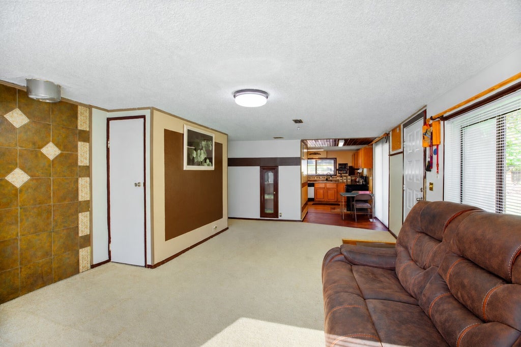 Photo of 10433 1st Avenue SW, Seattle, WA 98146 (MLS # 2595677)