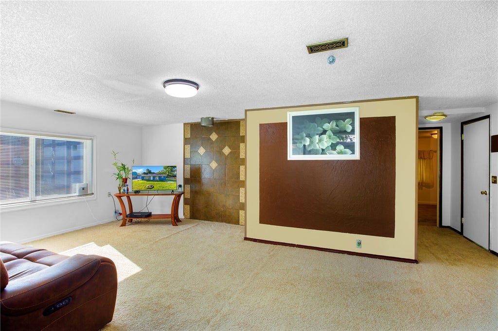 Photo of 10433 1st Avenue SW, Seattle, WA 98146 (MLS # 2595677)