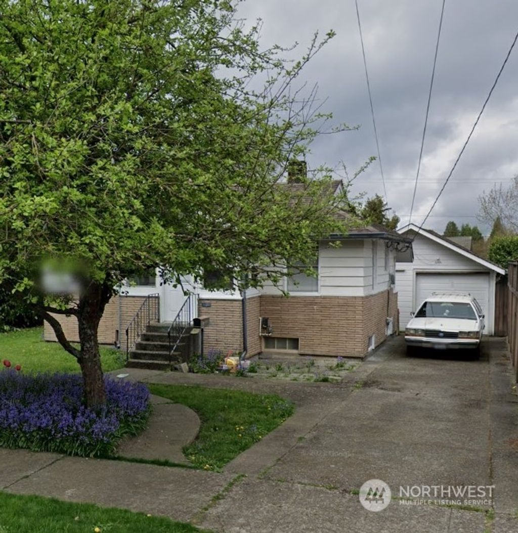 Photo of 8317 Earl Avenue NW, Seattle, WA 98117 (MLS # 2228039)