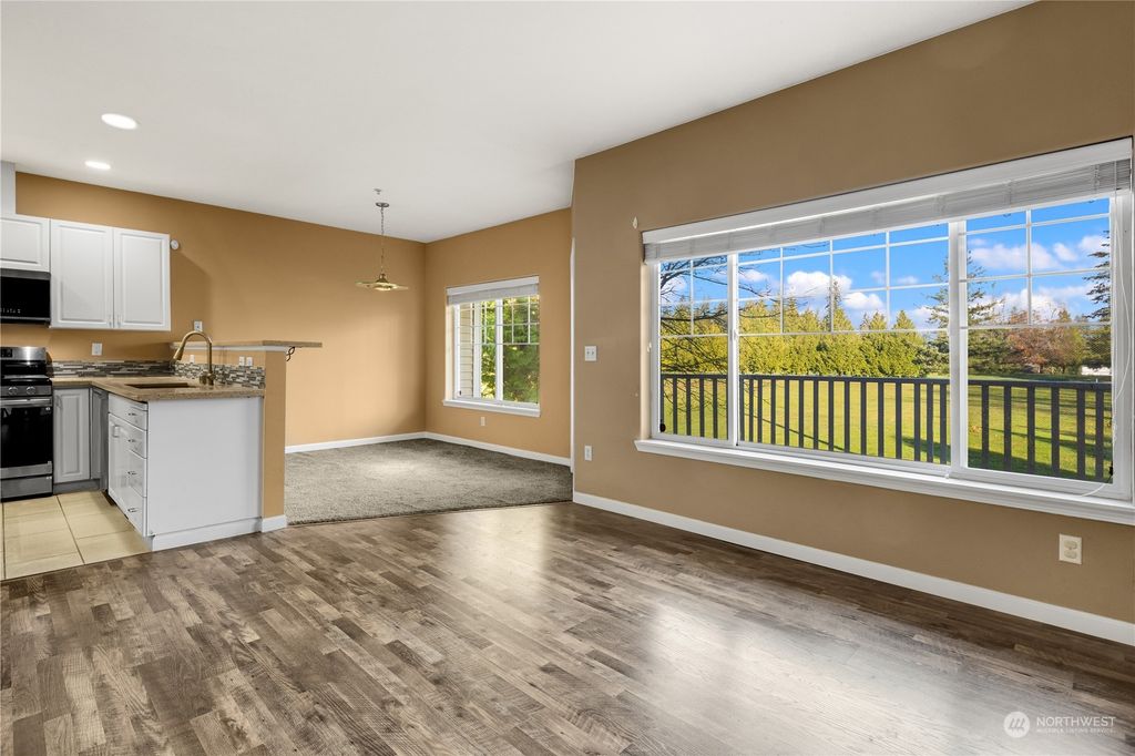 Photo of 14140 SE 171st Way #E201, Renton, WA 98058 (MLS # 2315091)