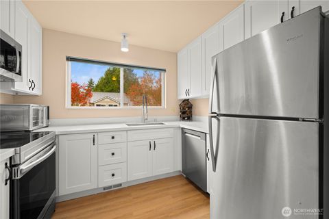Photo of 12024 101st Avenue NE #E2, Kirkland, WA 98034 (MLS # 2543614)