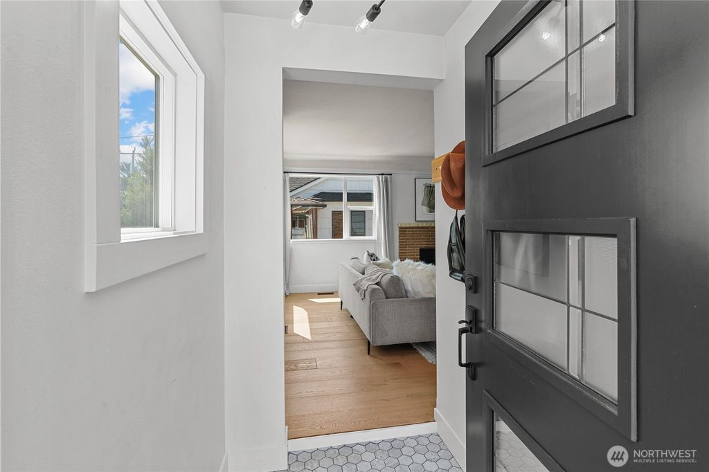 Photo of 3717 35th Avenue SW, Seattle, WA 98126 (MLS # 2408220)