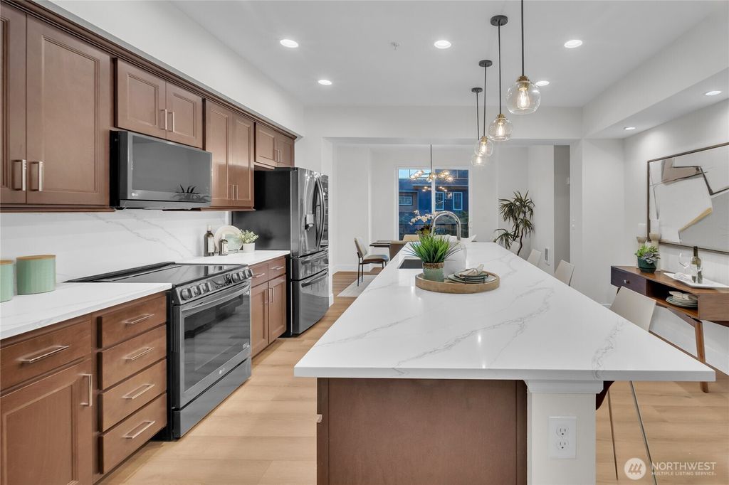 Photo of 10390 156th Place NE #102, Redmond, WA 98052 (MLS # 2435957)