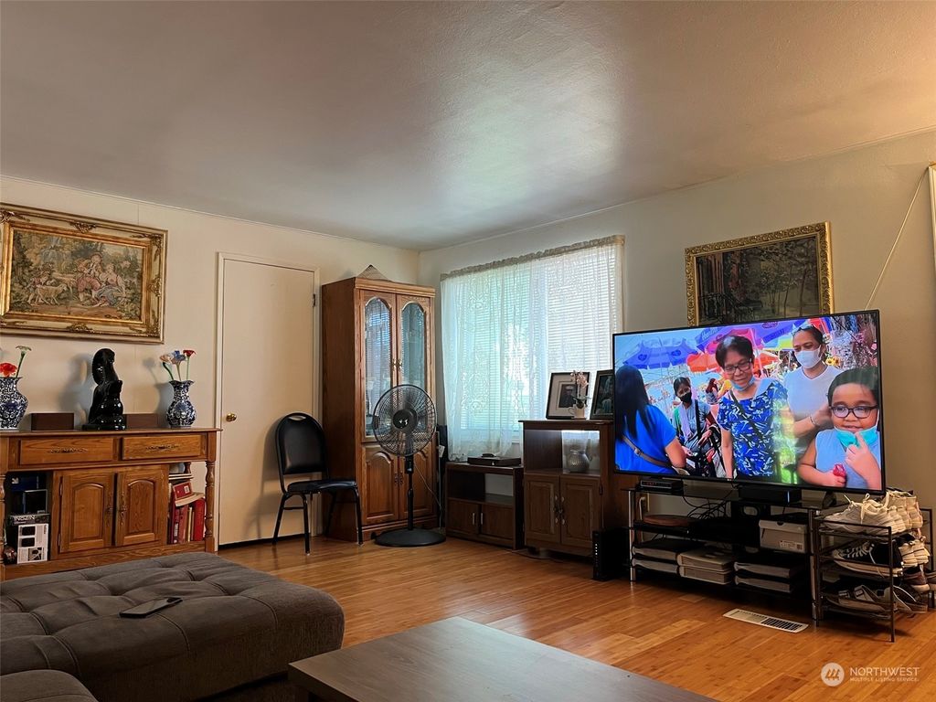 Photo of 8809 28th Avenue SW, Seattle, WA 98126 (MLS # 2222610)