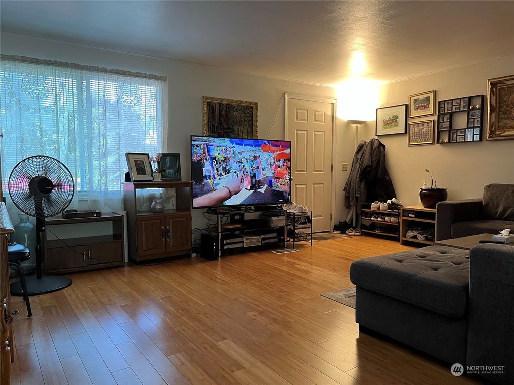 Photo of 8809 28th Avenue SW, Seattle, WA 98126 (MLS # 2222610)