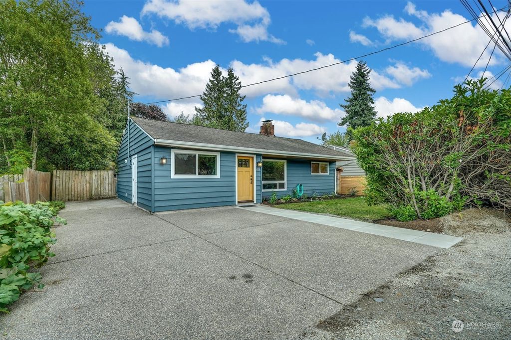 Photo of 1551 NE 135th Street, Seattle, WA 98125 (MLS # 2155616)