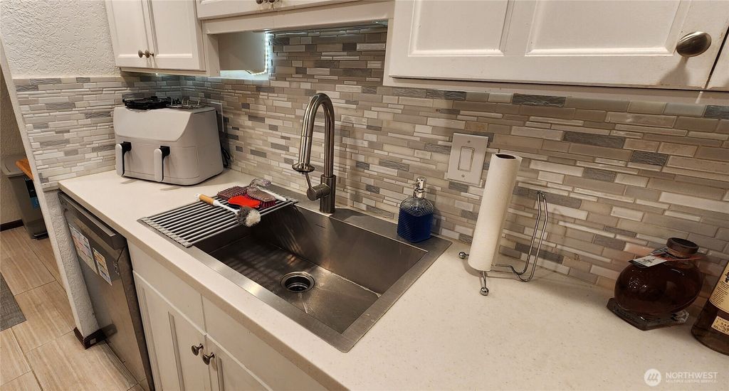 Photo of 23511 102 Avenue SE, Kent, WA 98031 (MLS # 2476905)