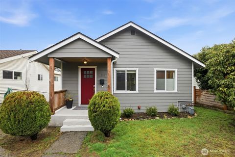 Photo of 8719 16th Avenue SW, Seattle, WA 98106 (MLS # 2497375)