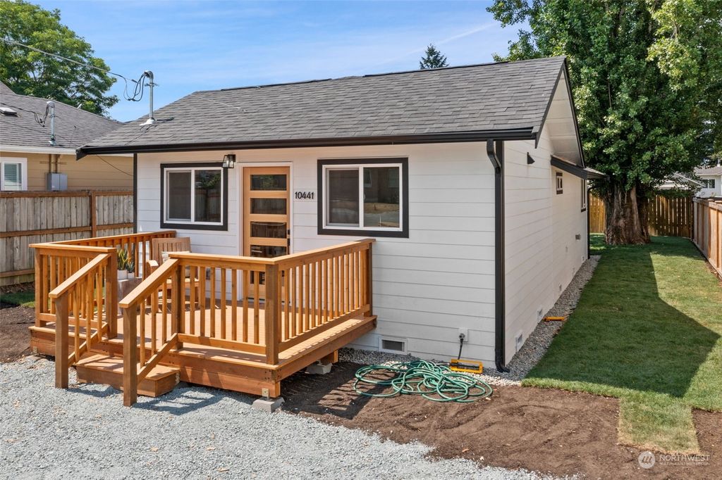 Photo of 10441 2nd Ave SW Ave, Seattle, WA 98146 (MLS # 2258034)