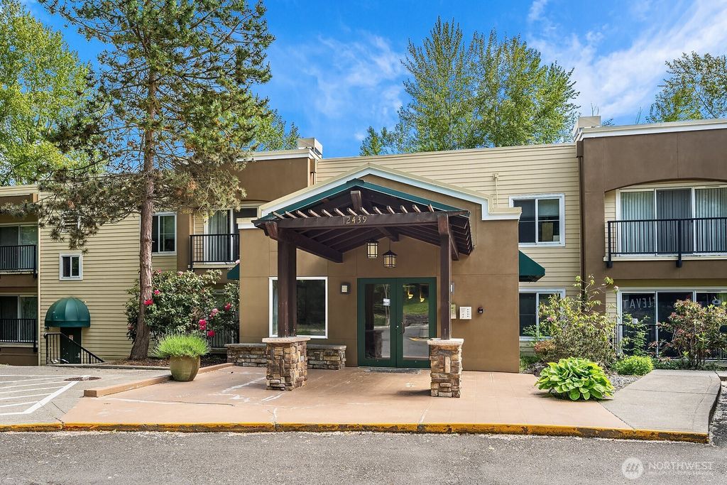 Photo of 12439 NE Totem Lake Way #106, Kirkland, WA 98034 (MLS # 2437430)
