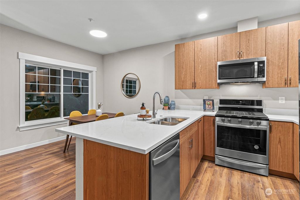 Photo of 14140 SE 171st Way #E204, Renton, WA 98058 (MLS # 2306917)