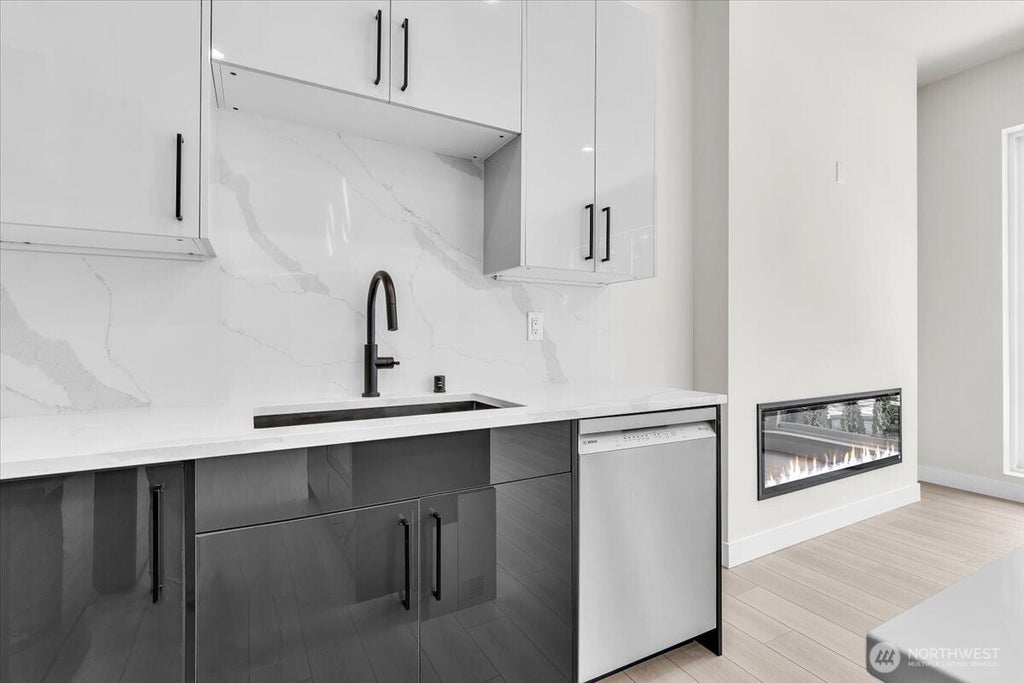 Photo of 7005 NE 182nd St ST #102, Kenmore, WA 98028 (MLS # 2581929)