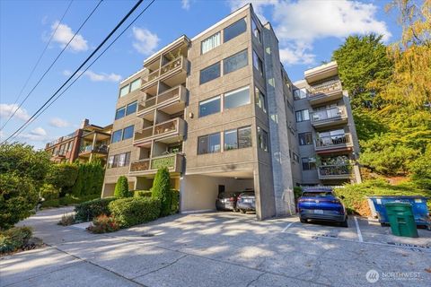 Photo of 654 W Olympic Place #101, Seattle, WA 98119 (MLS # 2453173)