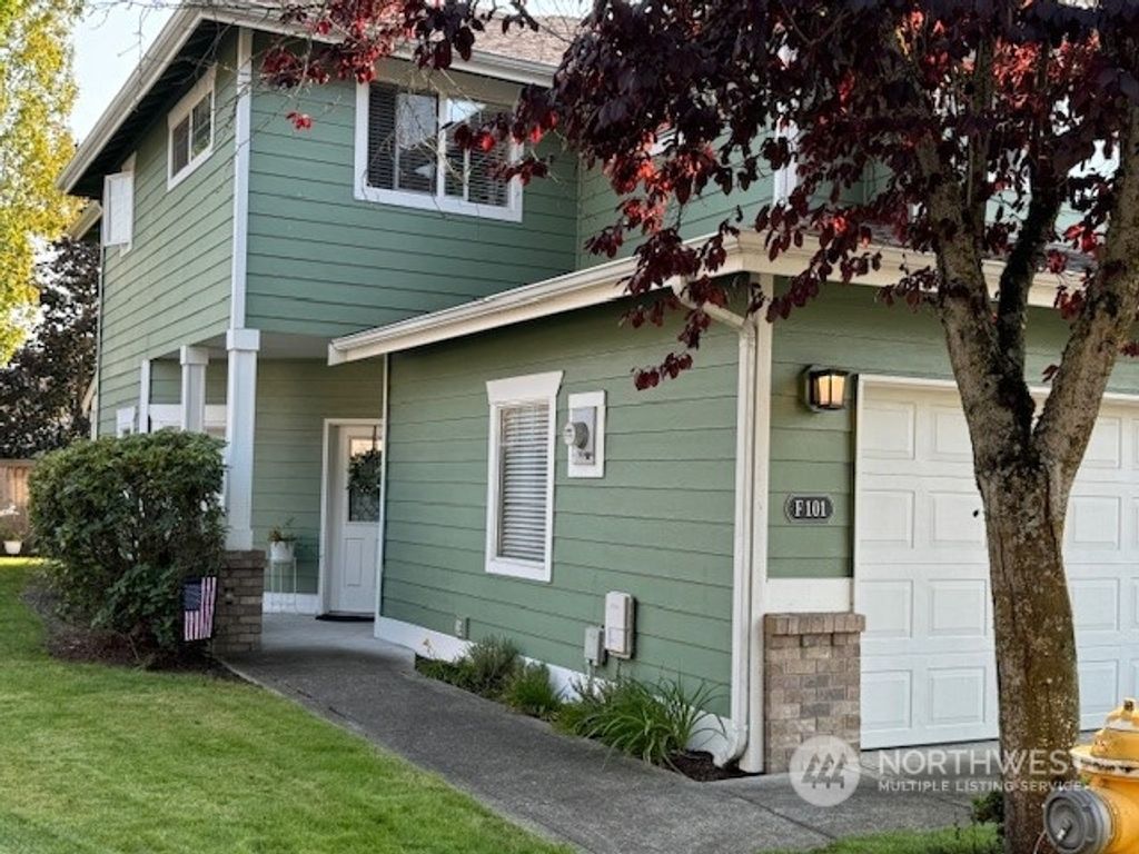 Photo of 10700 SE 260th Street #F101, Kent, WA 98030 (MLS # 2323675)