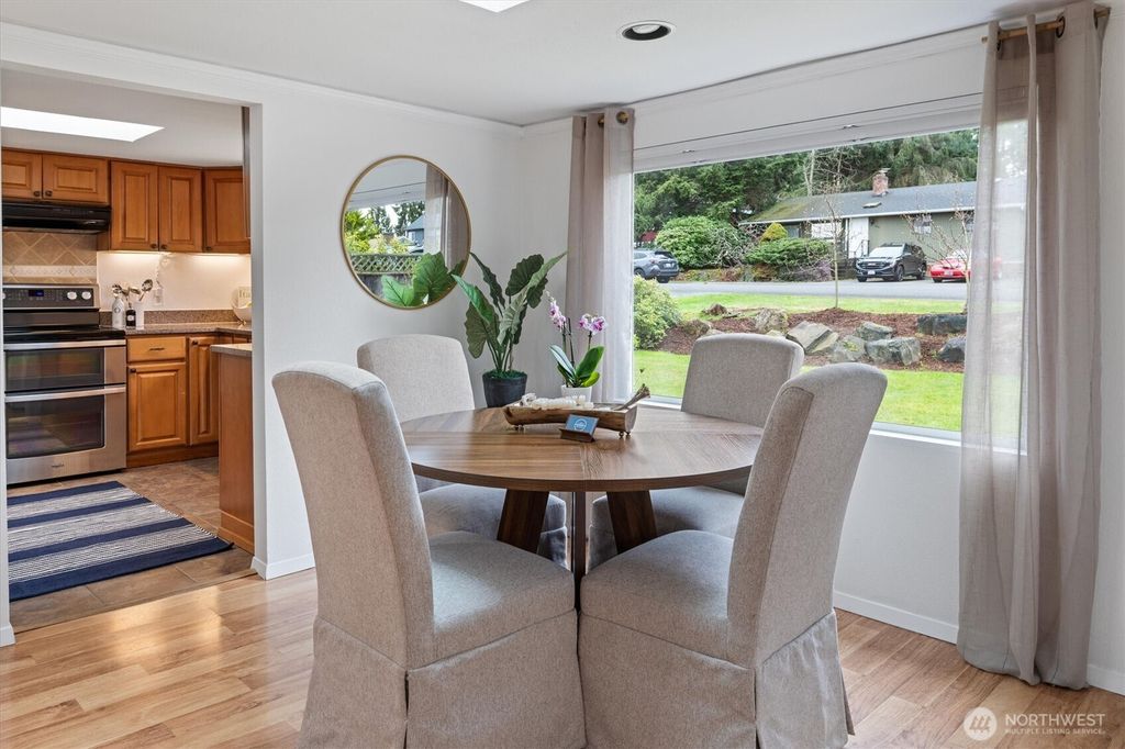 Photo of 10044 12th Avenue NW, Seattle, WA 98177 (MLS # 2502219)