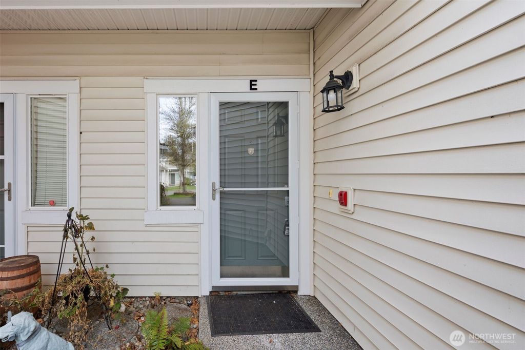 Photo of 4818 Davis Pl Pl S #53-E, Renton, WA 98055 (MLS # 2344423)