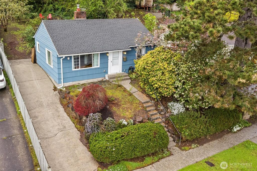 Photo of 9911 31St Avenue SW, Seattle, WA 98126 (MLS # 2516950)