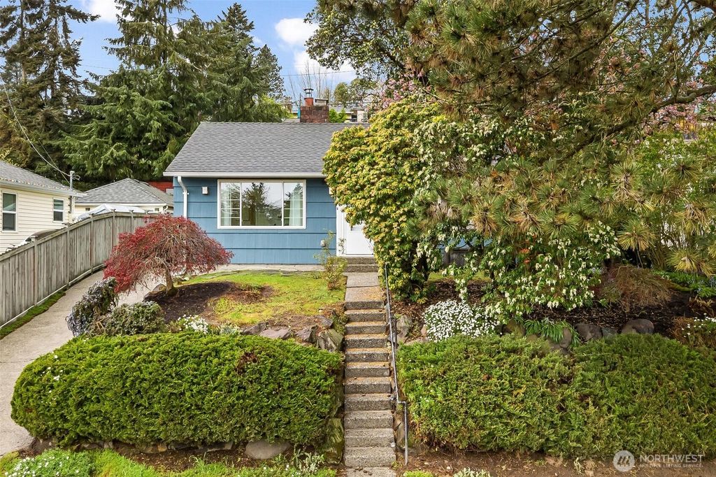 Photo of 9911 31St Avenue SW, Seattle, WA 98126 (MLS # 2516950)