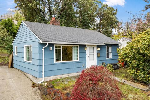 Photo of 9911 31St Avenue SW, Seattle, WA 98126 (MLS # 2516950)