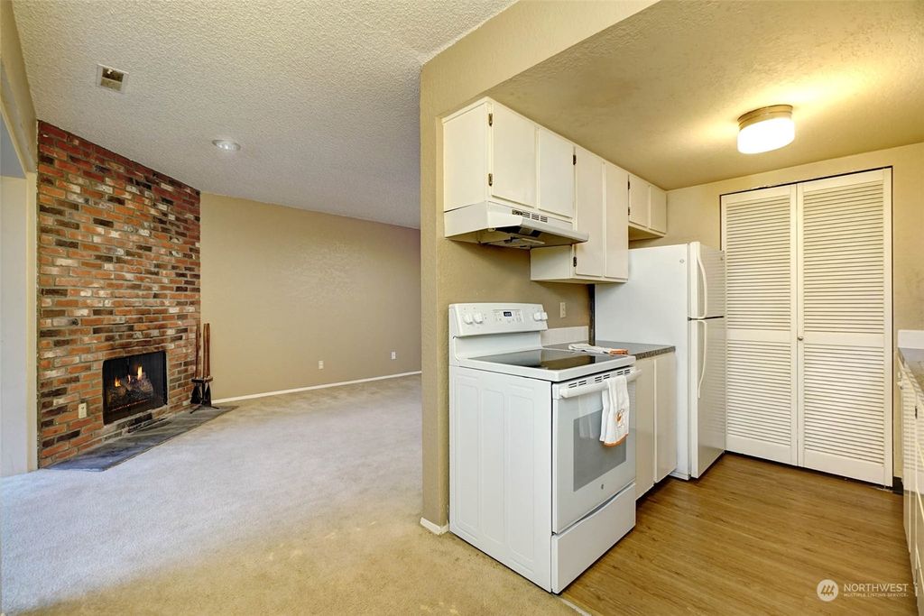 Photo of 6732 112th Avenue NE #A8, Kirkland, WA 98033 (MLS # 2030168)