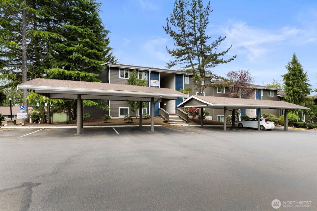 Photo of 20198 Vikings Crest Loop NE #8-102, Poulsbo, WA 98370 (MLS # 2517457)