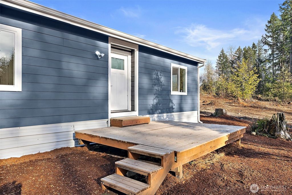 Photo of 30201 S Creek Road E, Graham, WA 98338 (MLS # 2483046)