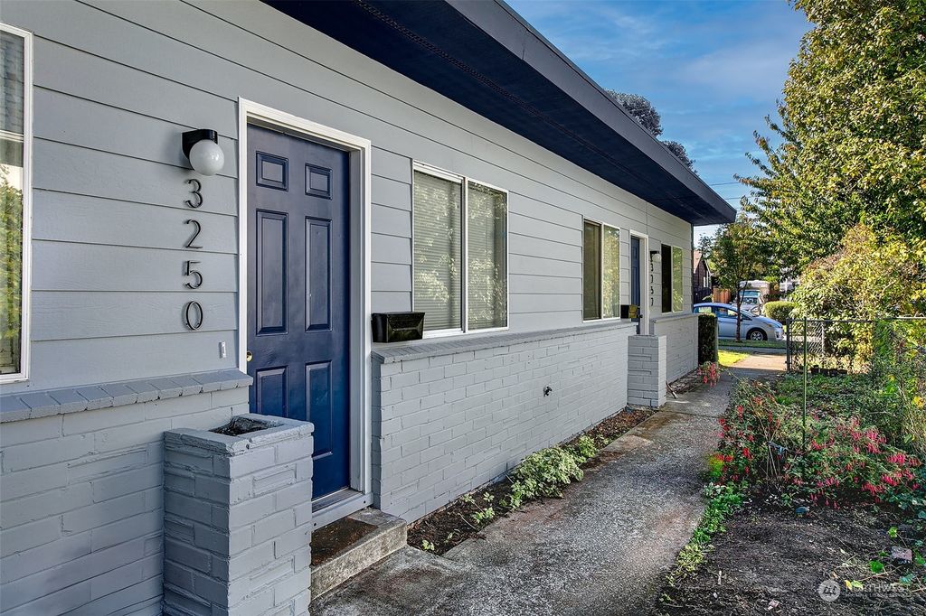 Photo of 3248 -3252 62nd Avenue SW, Seattle, WA 98116 (MLS # 2170846)