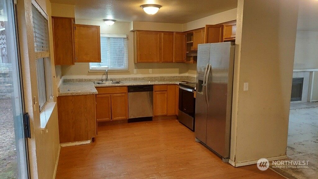 Photo of 202 S 316th Place, Federal Way, WA 98003 (MLS # 2159976)