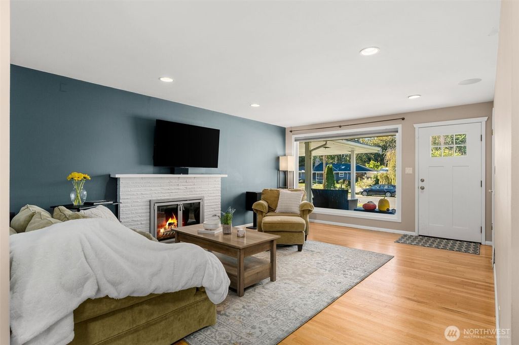 Photo of 12020 10th Avenue NW, Seattle, WA 98177 (MLS # 2444481)
